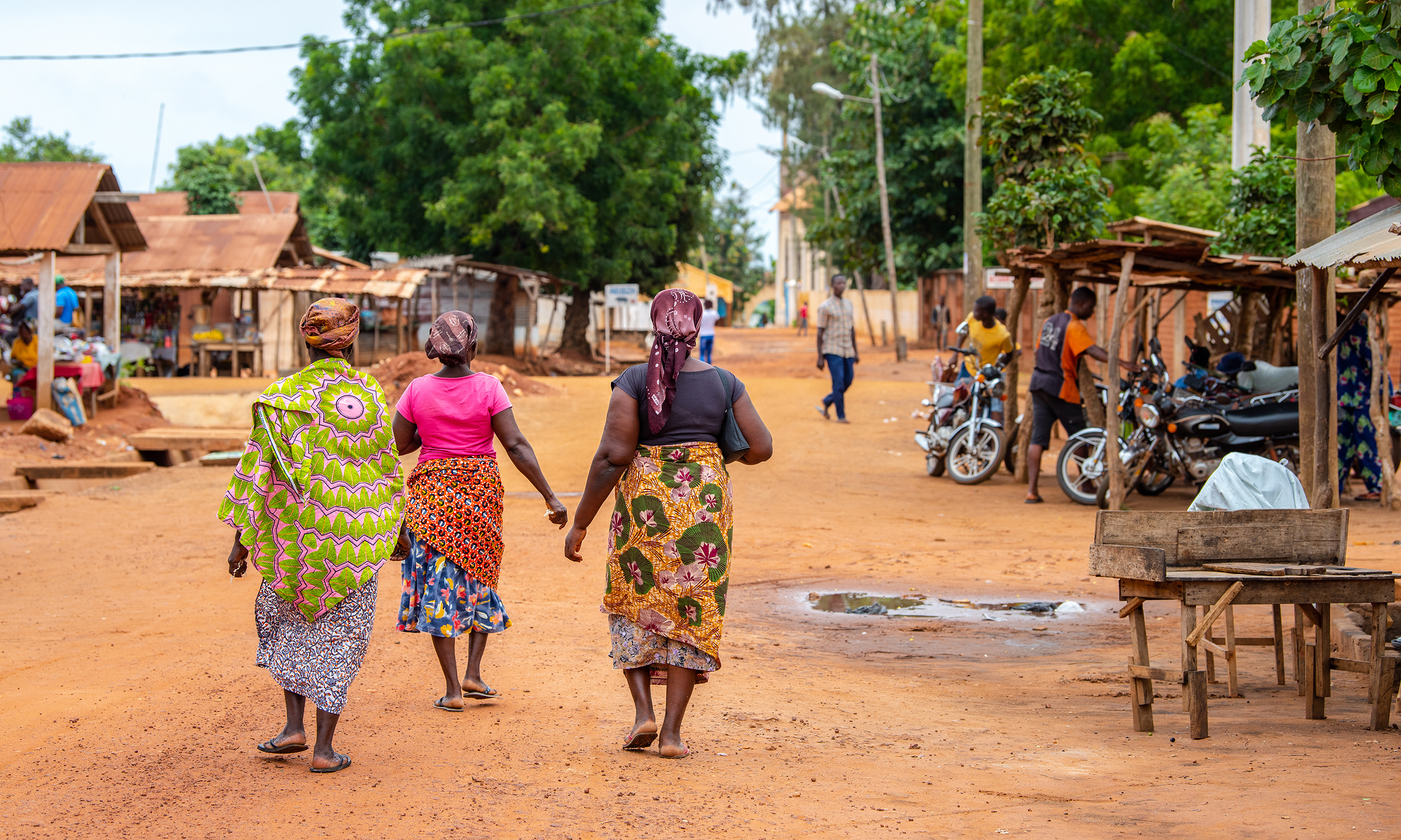 Togoville village in Togo. Women walking towards markets.