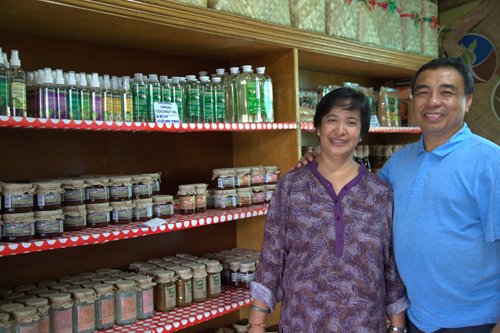 PIcture: CESO Client, Mr. and Mrs. Pasciolo in front of their flagship store